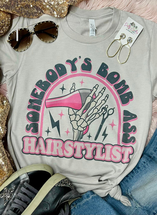 Somebody's Bombass Hairstylist Pink Rainbow  Stone Tee