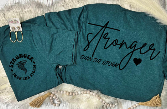 Stronger Than the Storm Front Pocket & Big on Back Design Teal Tee